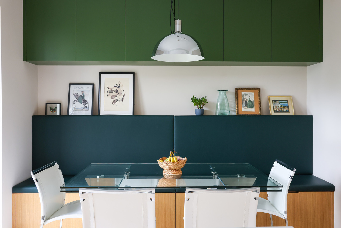 A wide bench has been laid out in the kitchen, for entertaining friends around the table. Photo: Marie Russillo/Maison Moderne