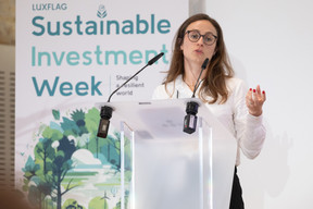 Helena Finn, counsel at Allen & Overy, seen speaking on the “ESG in the insurance sector: key obligations and impacts” panel at Luxflag Sustainable Investment Week, 18 October 2023. Photo: Guy Wolff/Maison Moderne