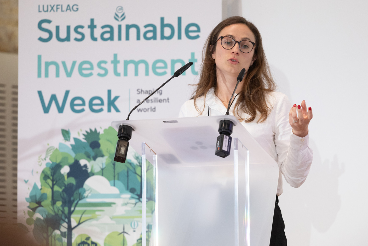 Helena Finn, counsel at Allen & Overy, seen speaking on the “ESG in the insurance sector: key obligations and impacts” panel at Luxflag Sustainable Investment Week, 18 October 2023. Photo: Guy Wolff/Maison Moderne
