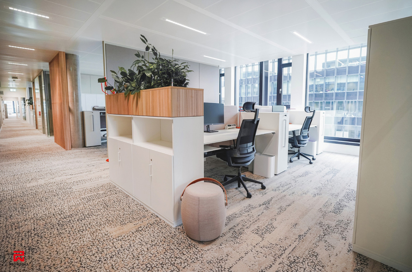 The offices are organised into open spaces with four workstations each. Photo: Fabrice Perrousse