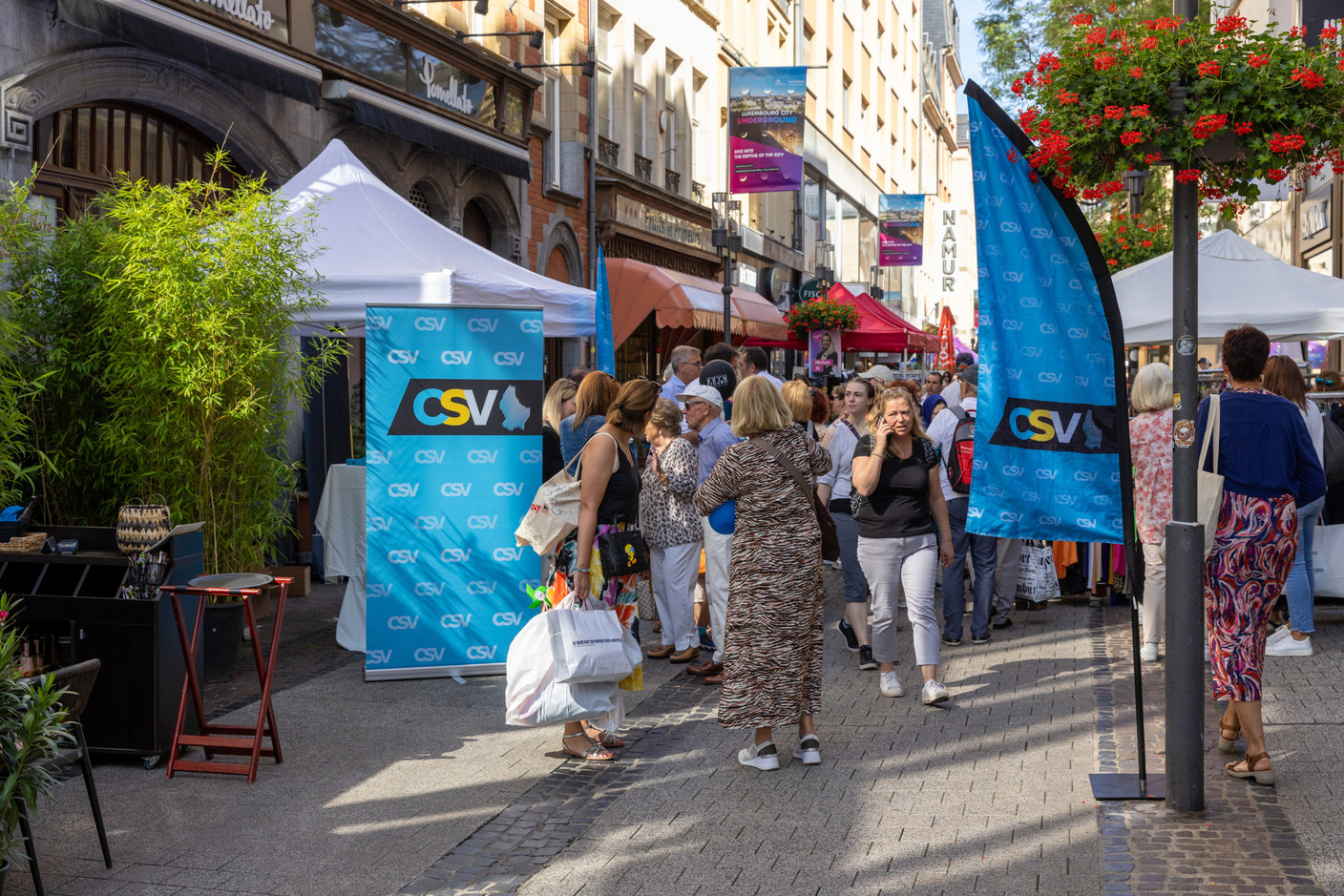 The CSV stand in Luxembourg City-Centre during the Grande Braderie (street market), a not-to-be-missed event for political parties, 4 September 2023. Photo: Romain Gamba / Maison Moderne