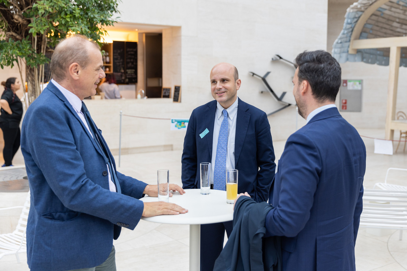 Francesco Pirovano of Intesa Sanpaolo (centre) is seen during Luxflag Sustainable Investment Week 2022, 17 October 2022. Photo: Romain Gamba/Maison Moderne