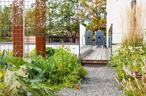 A footbridge links the house to the garden. Photo: Camille Dengler