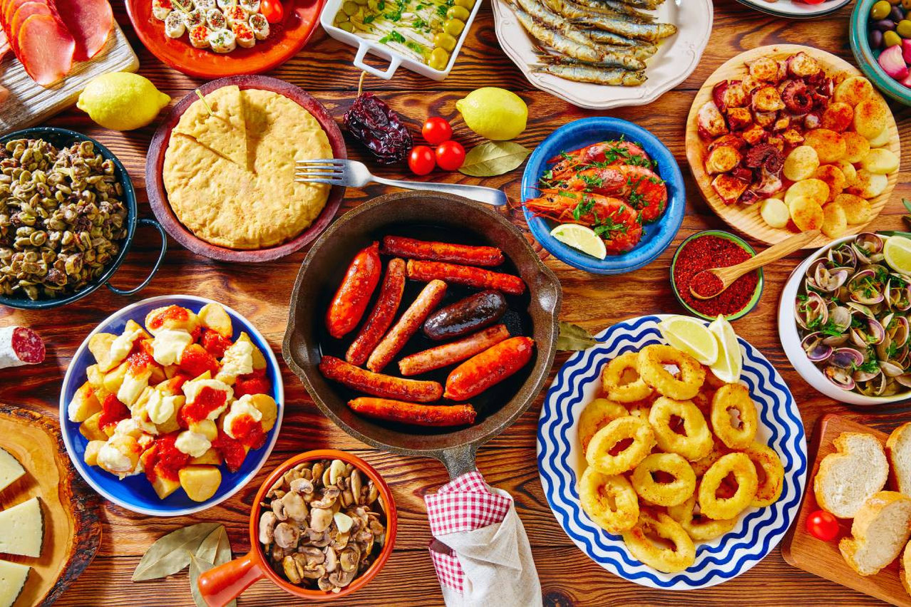 Spanish cuisine draws on Mediterranean inspiration, with an abundance of olive oil, vegetables, fish and seafood. Each region has its own rich and unique gastronomy. Photo: Shutterstock