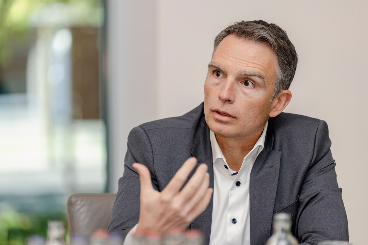 “80% of the economy is financed by loans in Europe.” To grant these loans, banks must raise capital. And in Europe, this capital is structurally more expensive than elsewhere – not because of Basel III, which Mr Grbic explicitly supports, but because of the additional layers that each national regulator imposes on top of it. Photo: Romain Gamba/Paperjam