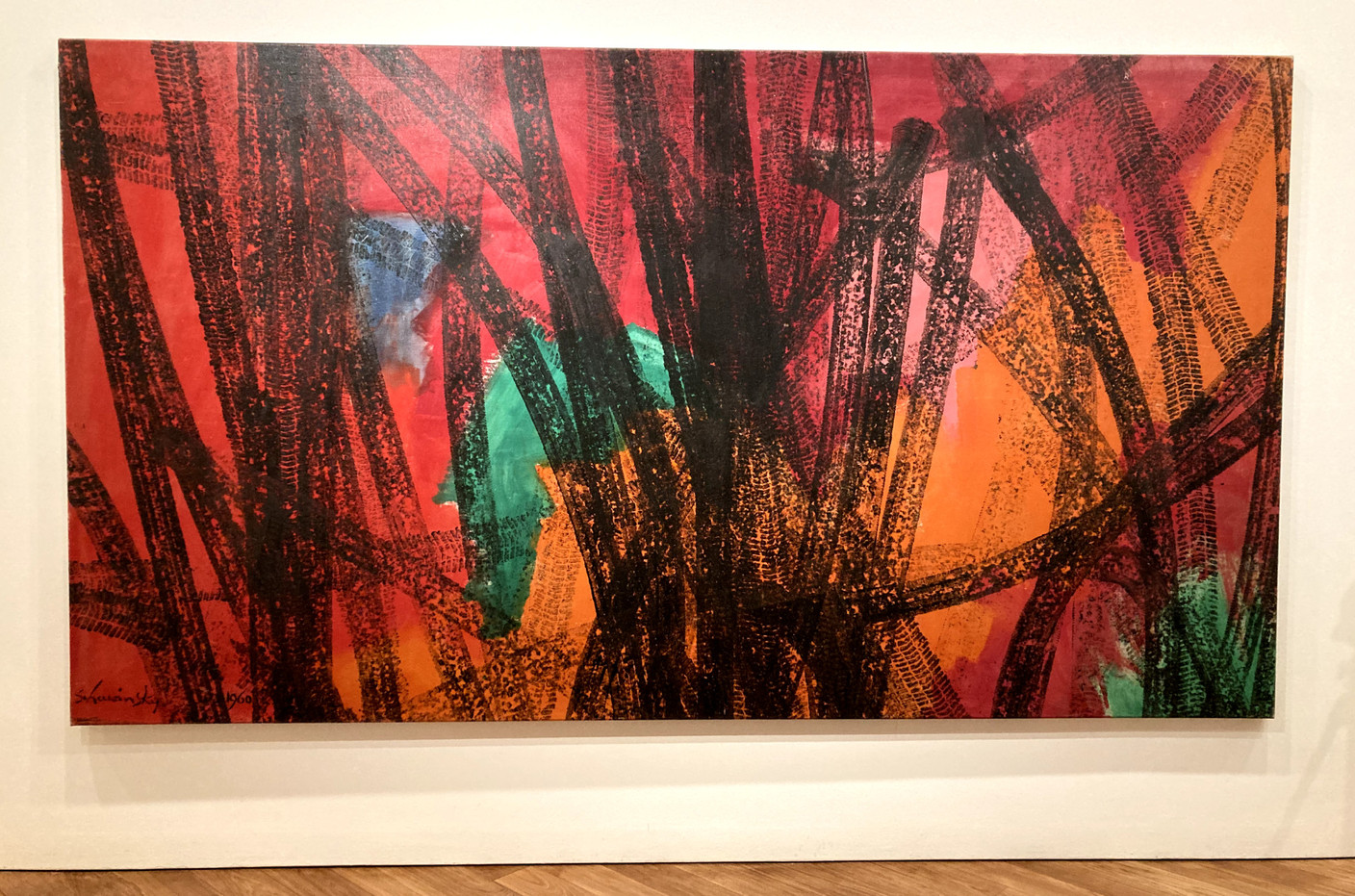 This painting was made from the tyre tracks of a car. Photo: Paperjam