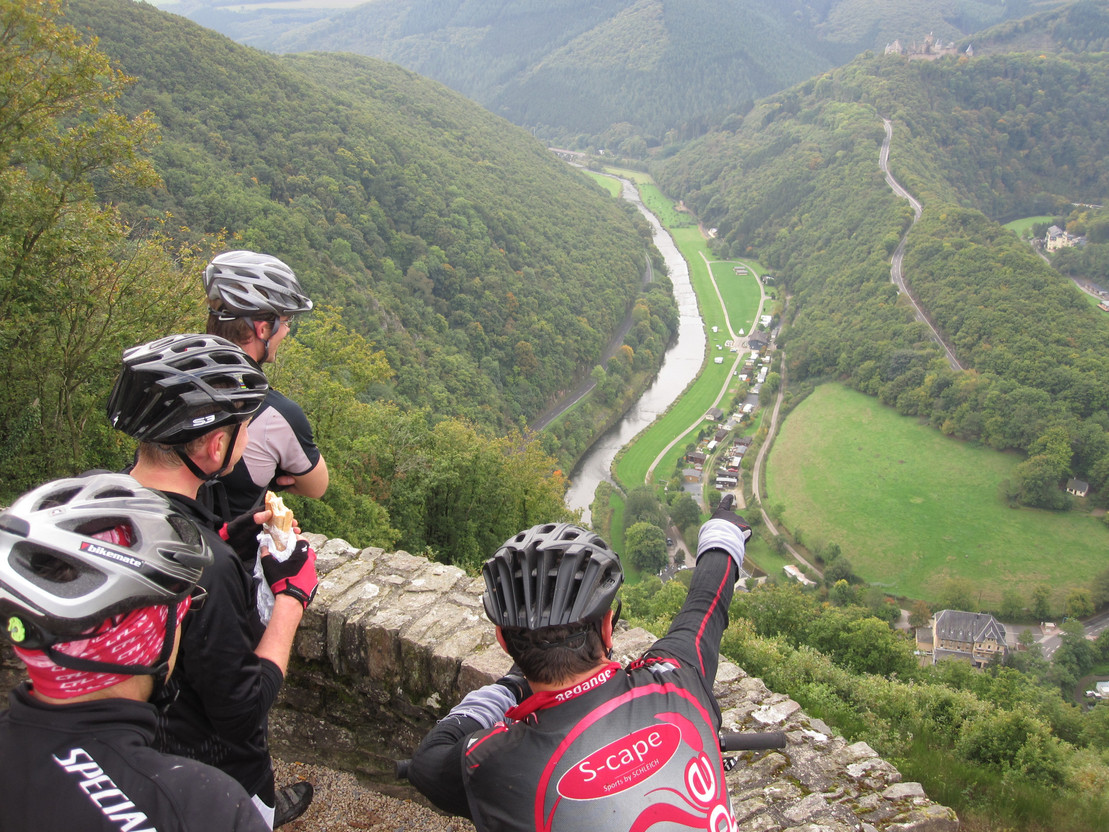 McQuaide’s cycling friends enjoy the view over Bourscheid valley Mike McQuaide
