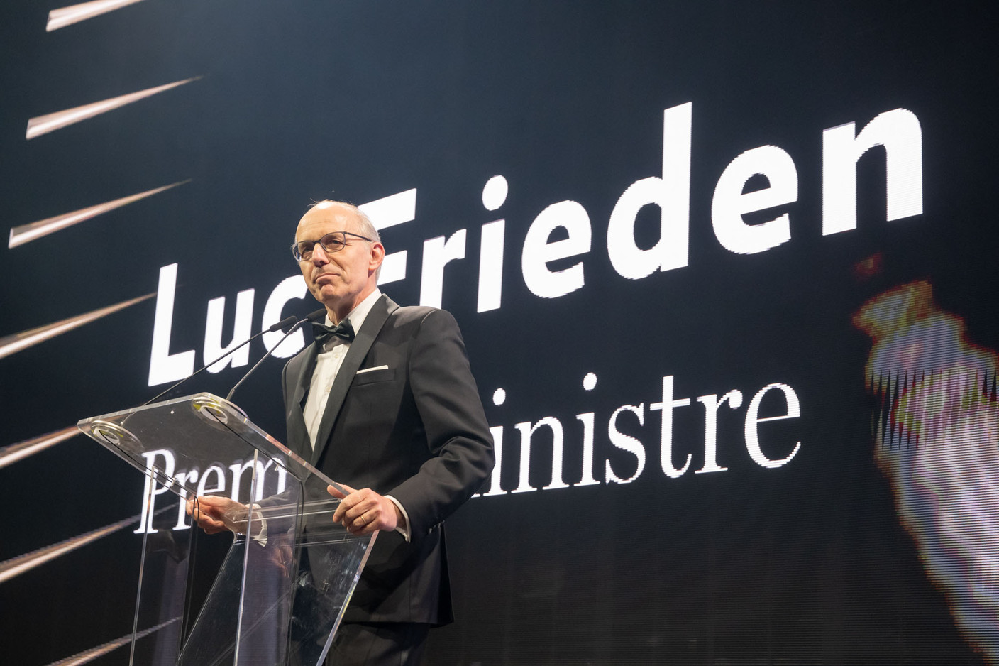 The prime minister, Luc Frieden (CSV), delivers the opening address during the Paperjam Top 100 ceremony at the Rockhal, 10 December 2024. Photos: Nader Ghavami / Maison Moderne