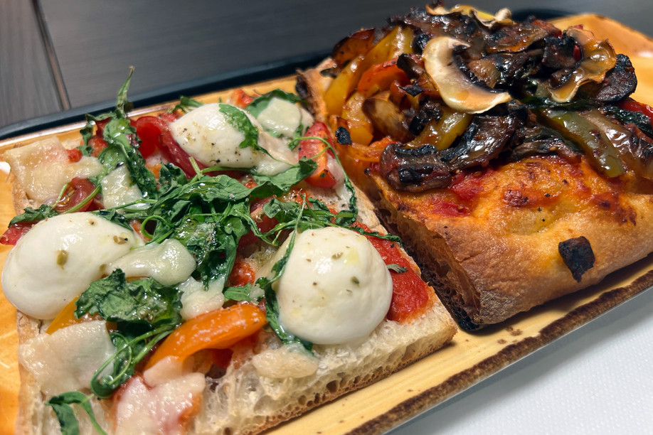 The pizza dough is thick and crispy.  Photo: Emilio Naud/Maison Moderne