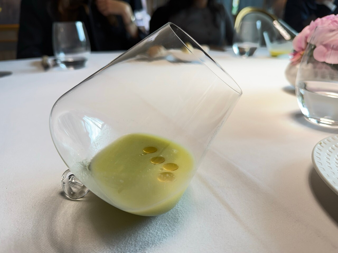 A mocktail made with lime syrup, coconut and lobster oil infused with verbena, created by chef Milan Brée at La Cristallerie. Photo: Emilie Gline/Paperjam