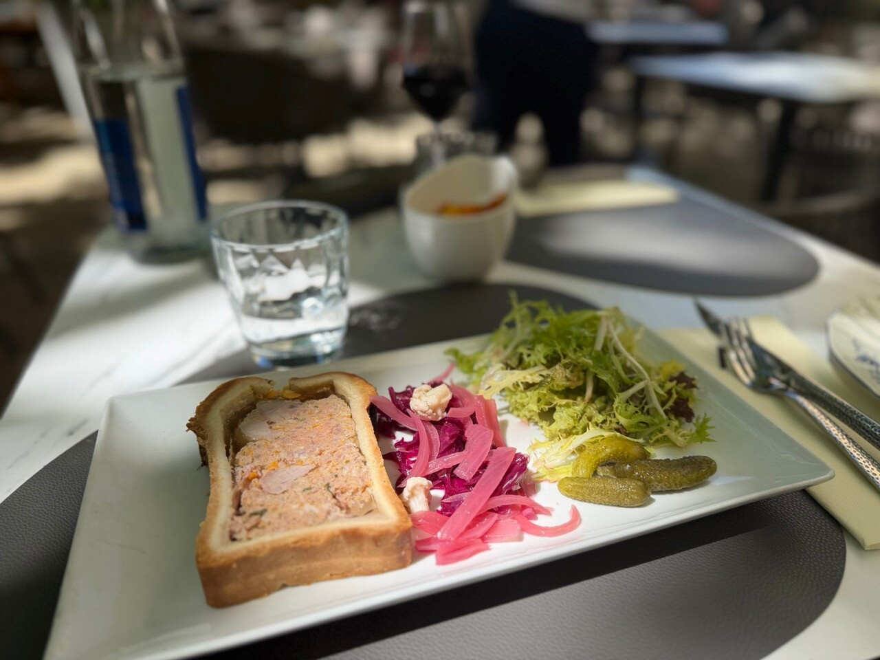 Luxembourgish pork pâté en croûte with sun-dried tomatoes and Thai basil, at Brasserie Mansfeld. Photo: Emilie Gline/Paperjam