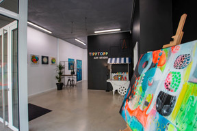 A view of the spacious and colourful art studio and art bar  TippTopp