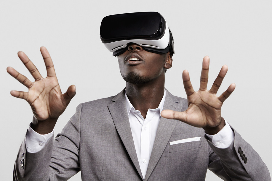 Illustration photo shows a man wearing formal suit and virtual reality headset. Photo: Shutterstock