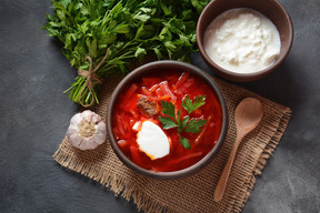 Traditional Ukrainian borscht. Ingredients (provided by Chiche!) include: bones for broth (lamb hip bones), potatoes, cabbage, carrot, onion, beetroot, tomato paste, garlic, bay leaf, pepper, sugar, lemon, spring onion, sour cream, flour, fresh yeast, sunflower oil, rapeseed oil Natalia Hanin/Shutterstock