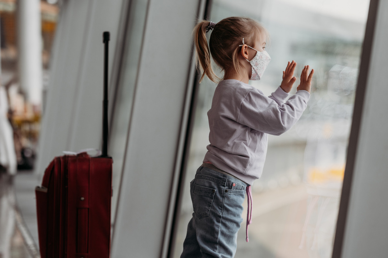 Kid at departure gate. Photo: Shutterstock