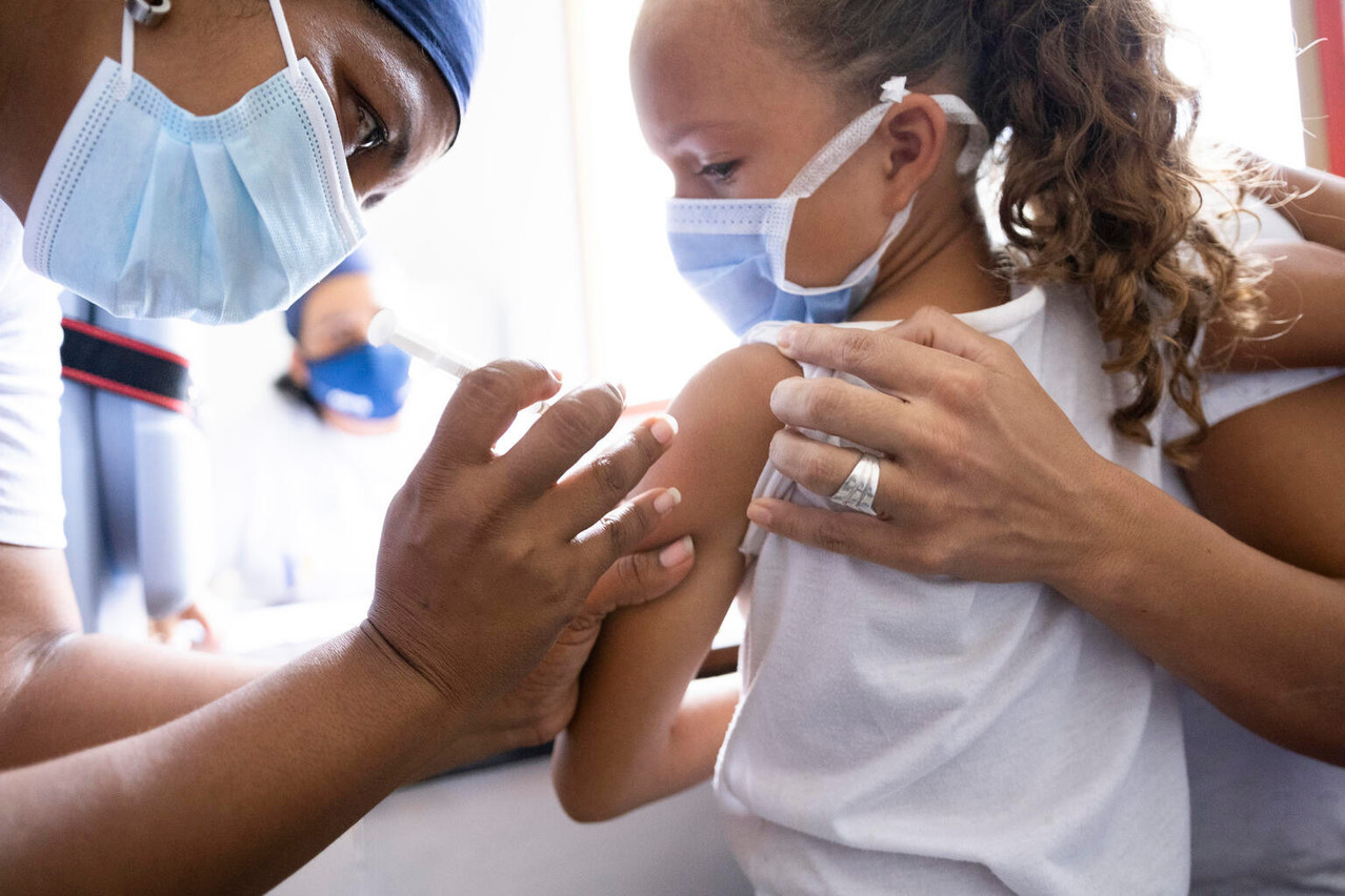 
Seven-year-old Karla Flores is given a shot during a mass vaccination day in the San Vicente community, Miranda state, in Venezuela in September. UNICEF/Cesar Poveda