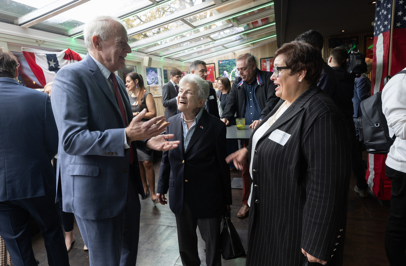 Tom Barrett (US ambassador to Luxembourg), Colette Flesch, and Carin Lobbezoo (ambassador of the Netherlands to Luxembourg) at the US election watch party held at The Spot in Luxembourg City, 6 November 2024. Photo: Guy Wolff/Maison Moderne