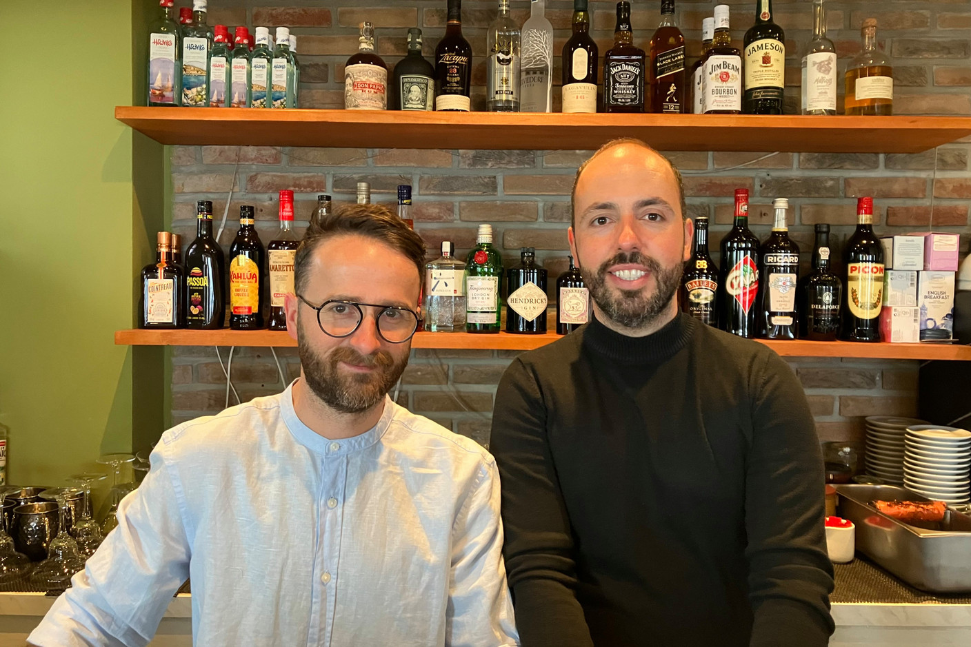 Andreas and Spiros, two of the three friends who run Nostos, a newly opened Greek restaurant in Bonnevoie. Demetris (not pictured) is the chef. Photo: Lydia Linna/Maison Moderne