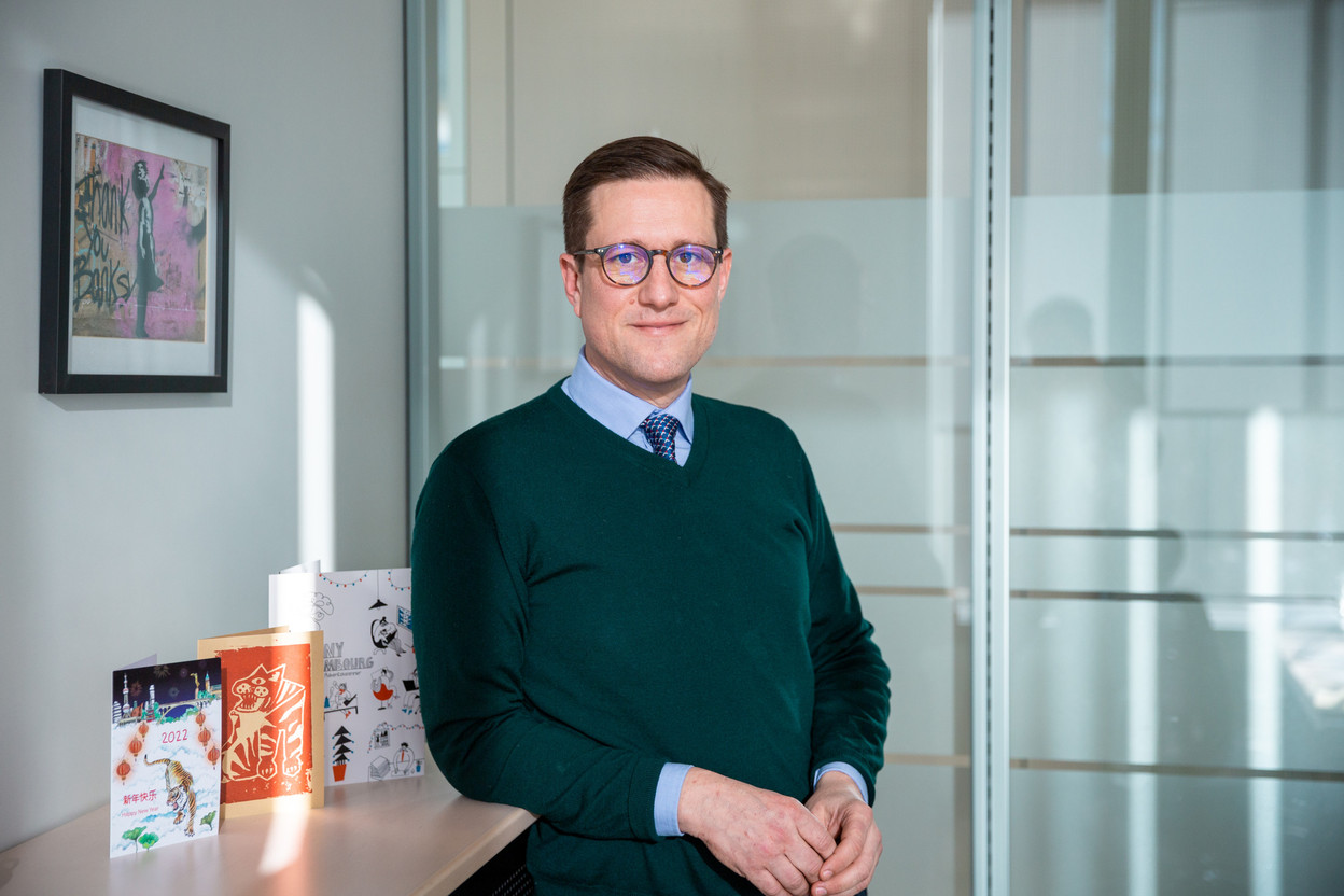 Philipp von Restorff, deputy CEO of Luxembourg for Finance. The wall in his office features street art that he bought in New York City. Photo: Romain Gamba/Maison Moderne