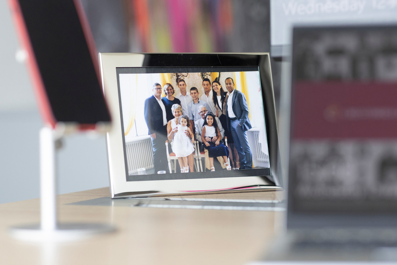 Grave doesn’t have many personal items on her actual desk. This family photo is the exception. Photo: Guy Wolff/Maison Moderne