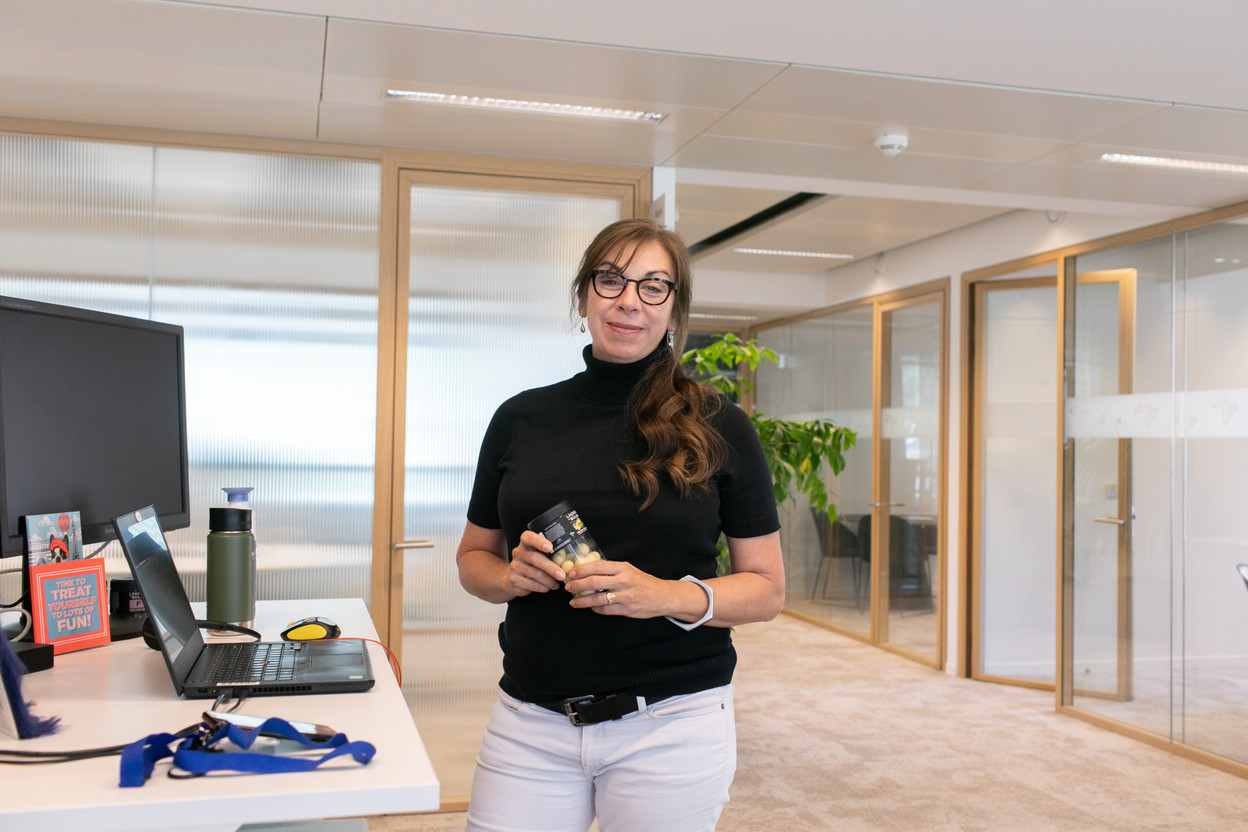 Tonya Stoneman, content manager for the advisory team at Nordea Asset Management, is seen holding a box of Danish liquorice, a popular treat in her office. Photo: Matic Zorman