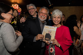 2016: Francisco Benavente and Carolina Lazo hold a copy of Delano magazine, which featured Lazo on the cover and Benavente inside, during the “Miami Beach Party” at Melusina. Maison Moderne archives