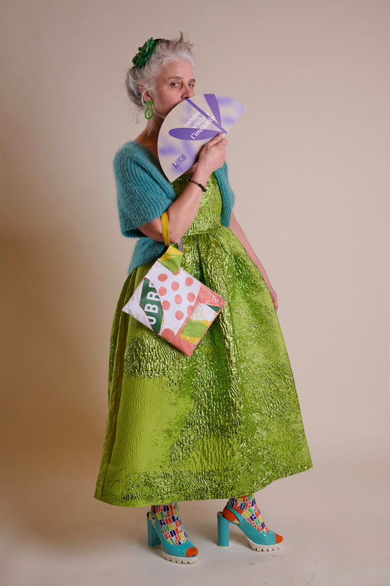 Stine Goya dress made of recycled material, vintage bolero bought secondhand, Luga socks and fan, vintage shoes bought secondhand in Luxembourg. Photo: Nader Ghavami