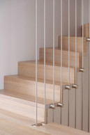 Staircase by TS Concept, designed to open up the space and allow light to flow through. (Photo: Jan Hanrion/Paperjam)