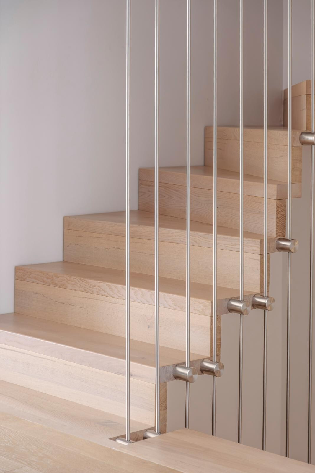Staircase by TS Concept, designed to open up the space and allow light to flow through. (Photo: Jan Hanrion/Paperjam)