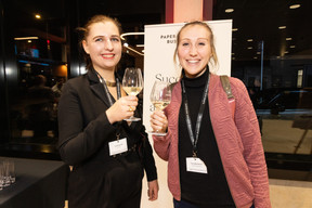 Emilie Walter (E2M SARL) and Fanny Beaumont (Dejardin Consulting) during the women-on-winetasting event at the Mini dealership in Cloche d’Or on Thursday 25 January 2024. Photo: Marie Russillo/Maison Moderne