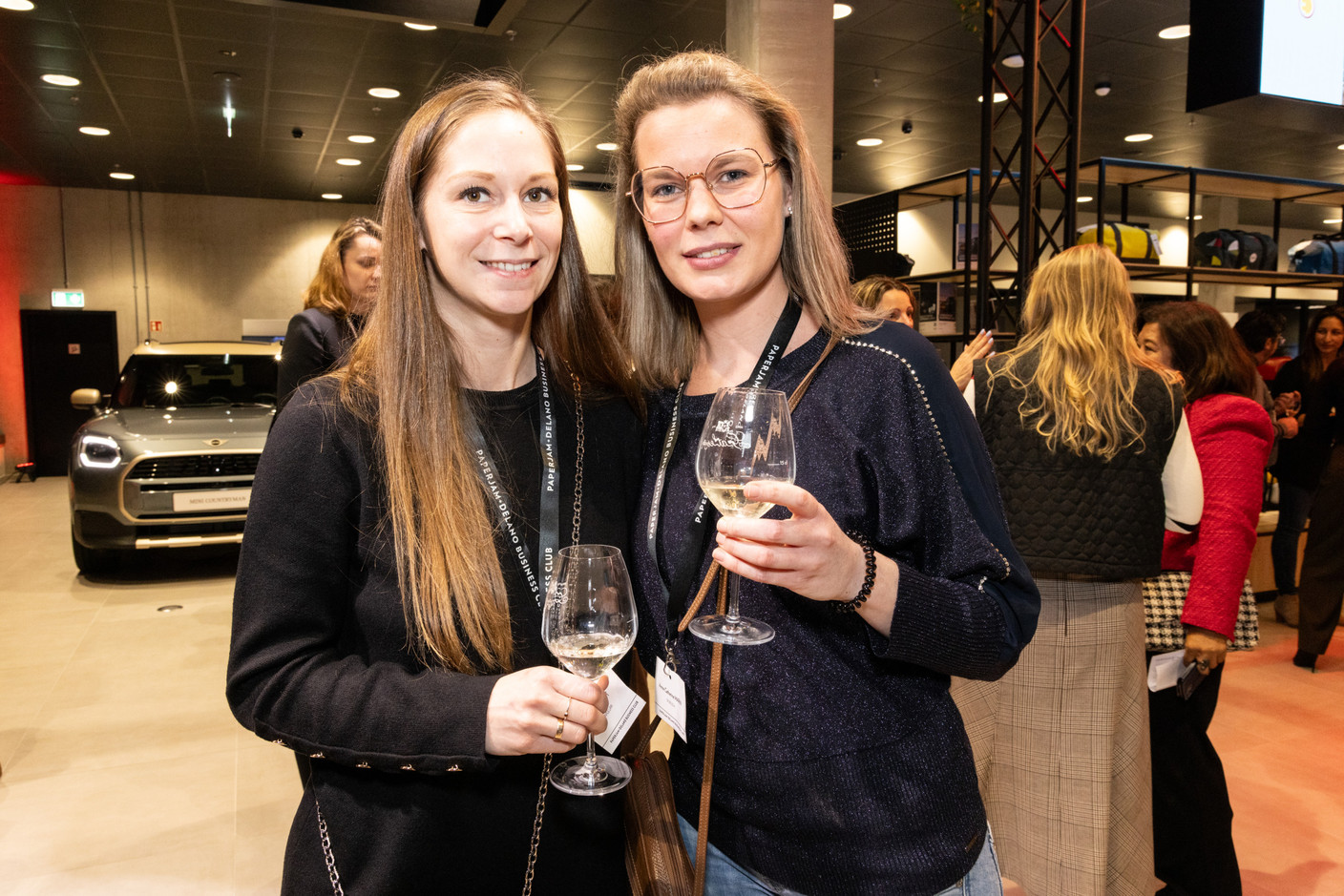Emilie Scheidt (Savile Law) and Anne-Catherine Marin (De Belsch) during the women-on-winetasting event at the Mini dealership in Cloche d’Or on Thursday 25 January 2024. Photo: Marie Russillo/Maison Moderne