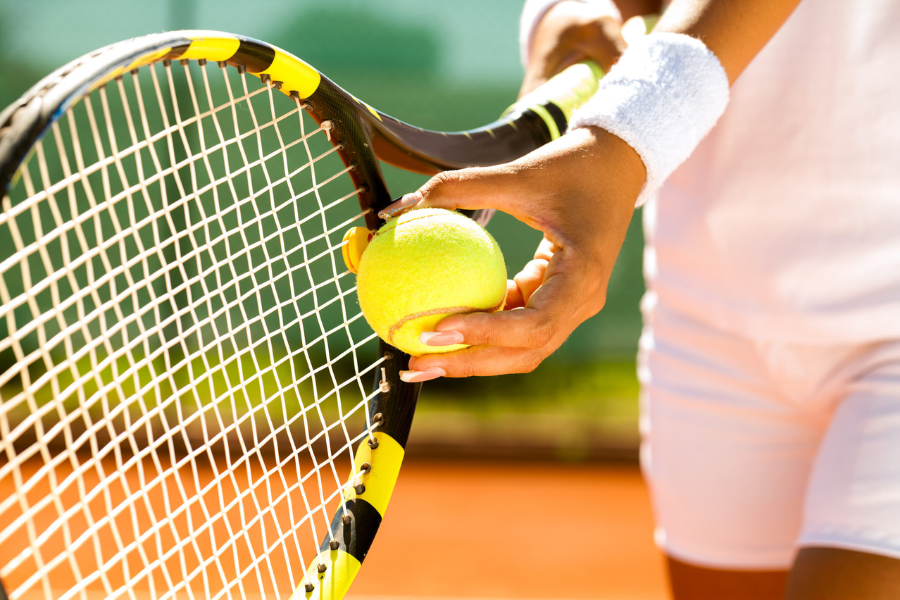 Play tennis for a good cause. Photo: Shutterstock